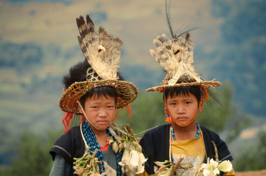 Adi tribe in traditional farming and festive attire
