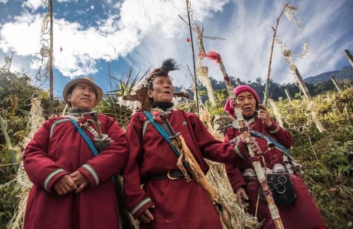 agin tribe people in traditional handwoven dress